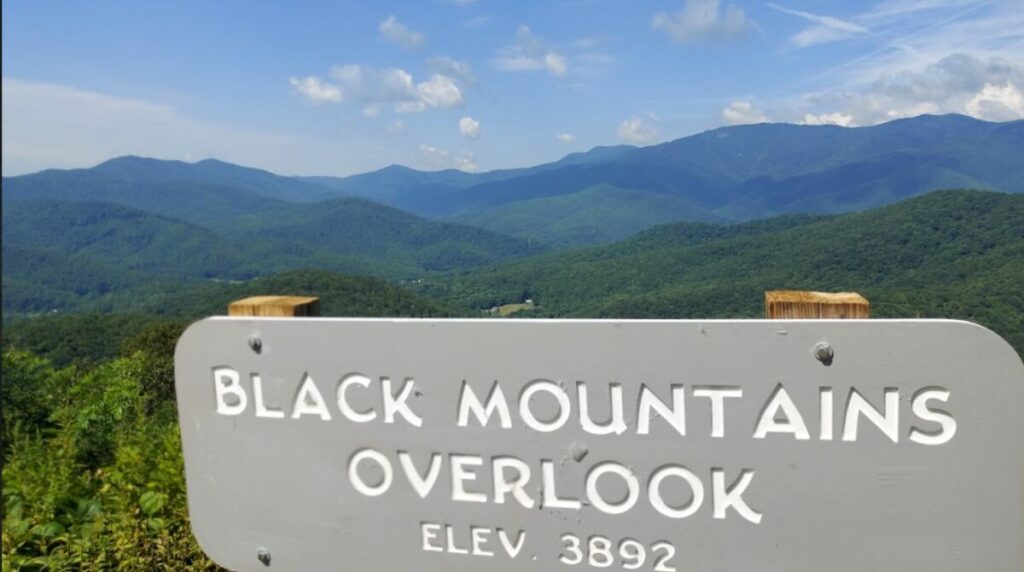  Blue Ridge Parkway Sign for the Black Mountains Overlook Elev 3892 view of Mount Mitchell, Mount Craig, and Big Tom in the distance