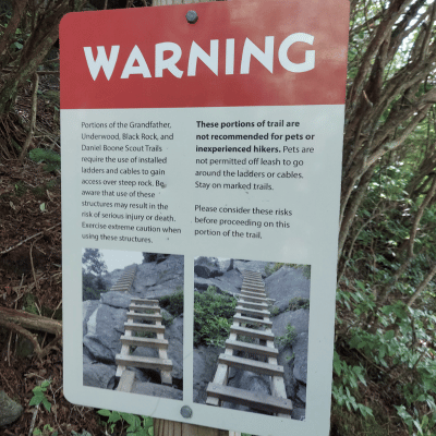 warning sign for the ladders up ahead on the grandfather trail